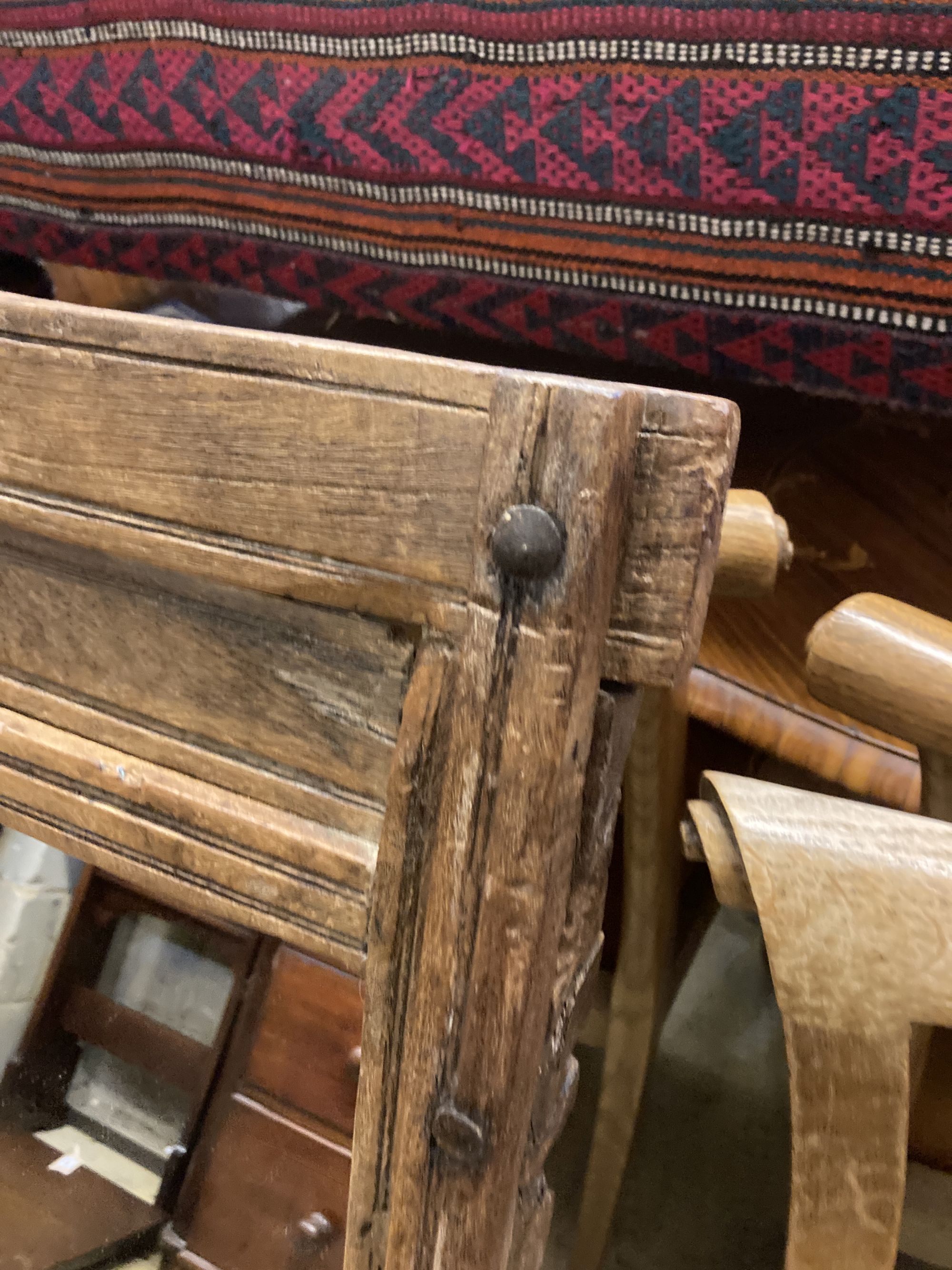 An Indonesian hardwood wall mirror, width 58cm, height 67cm